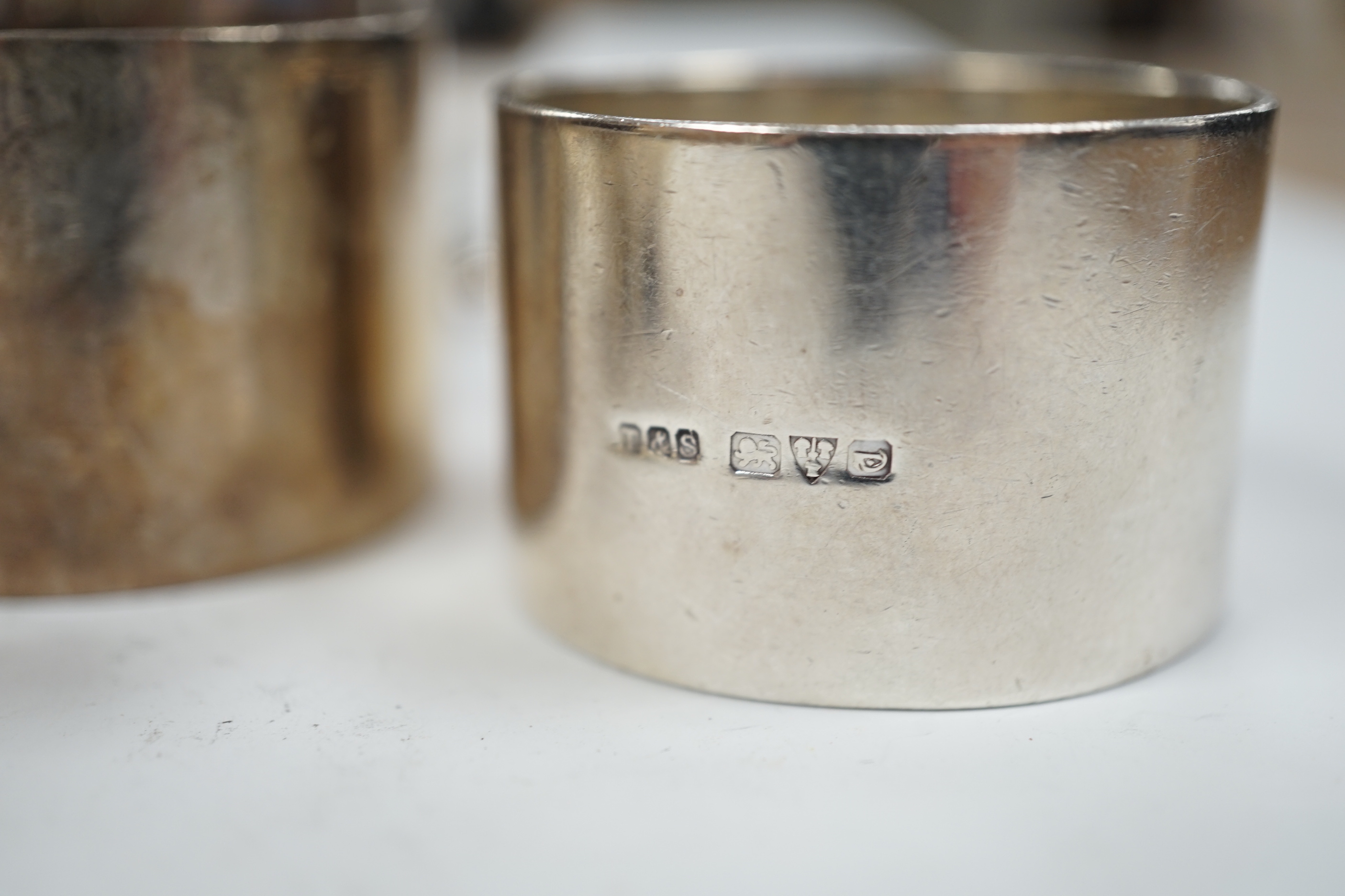 Small silver to include a christening mug, a Victorian milk jug, London, 1872 a trinket box, a small quaich and two napkin rings.